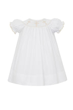 Robe d'évêque blanche avec croix dorées brodées