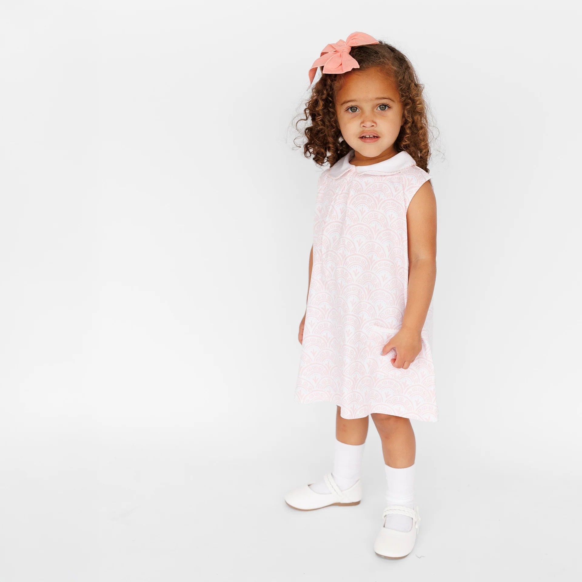 Robe tournante rose à poches festonnées pour fille